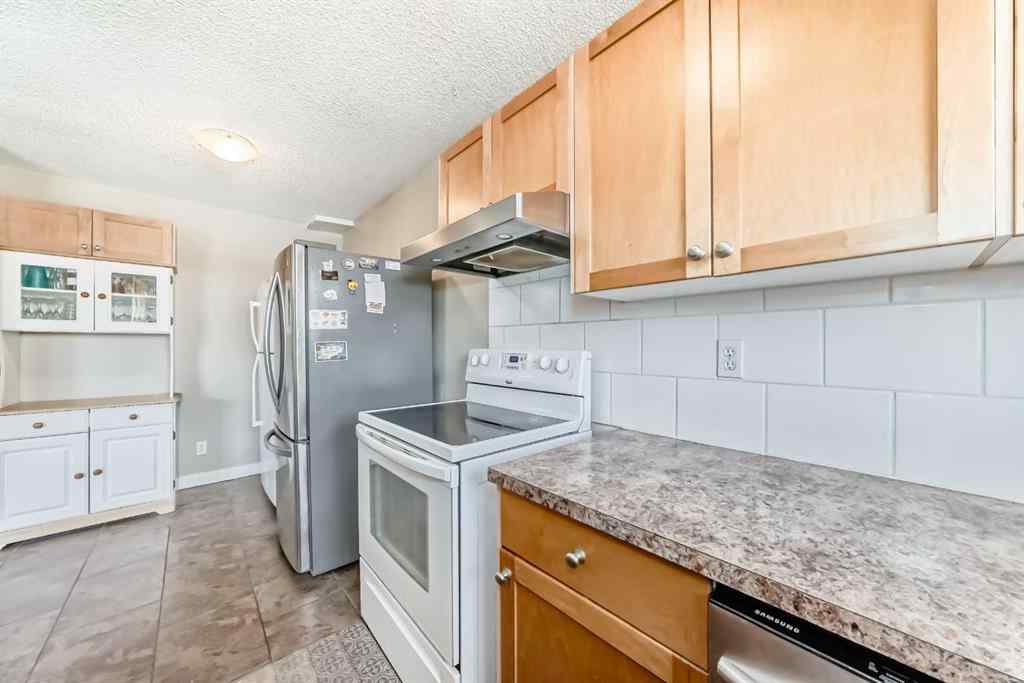 MLS® A2217421 - 148 Pinemill Mews NE in Pineridge Calgary, Residential