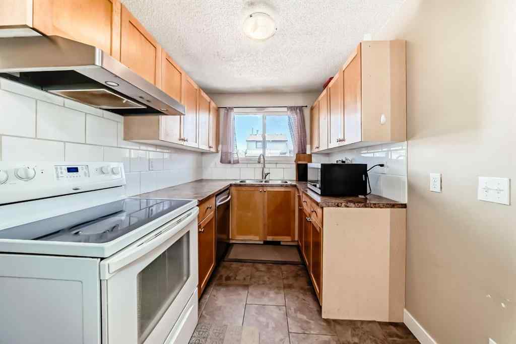 MLS® A2217421 - 148 Pinemill Mews NE in Pineridge Calgary, Residential