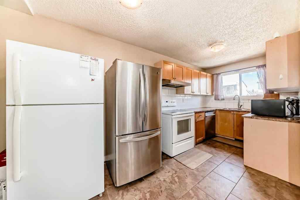 MLS® A2217421 - 148 Pinemill Mews NE in Pineridge Calgary, Residential