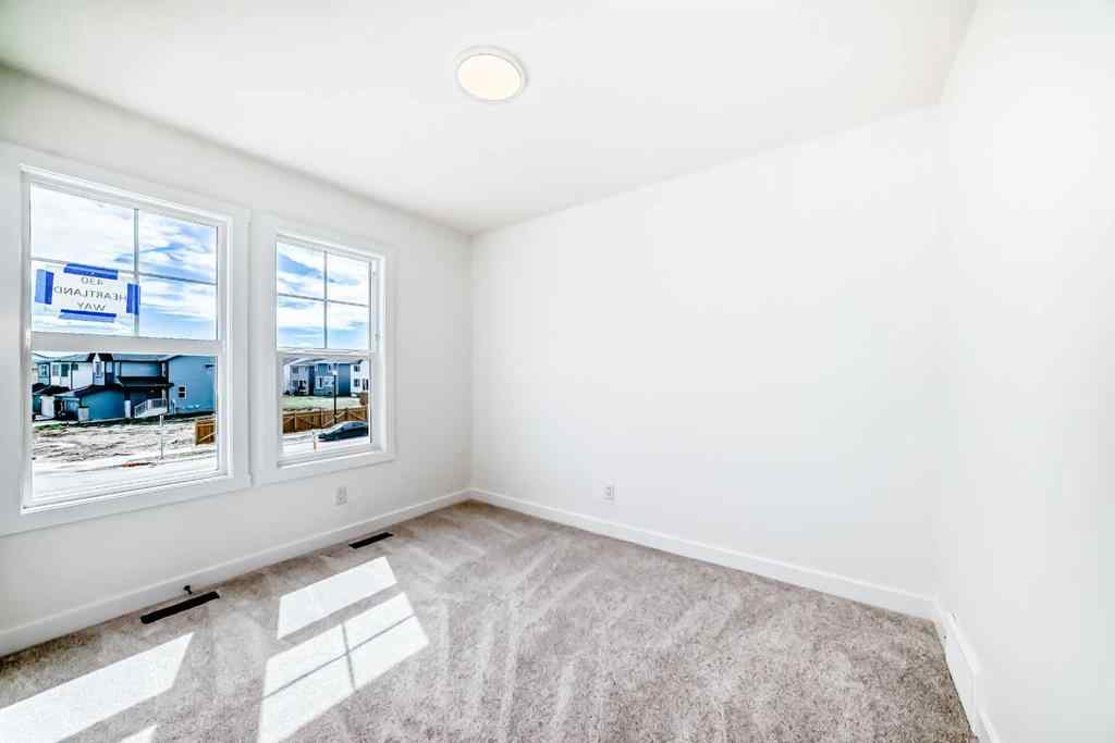 MLS® A2217577 - 430 Heartland Way  in Heartland Cochrane, Residential