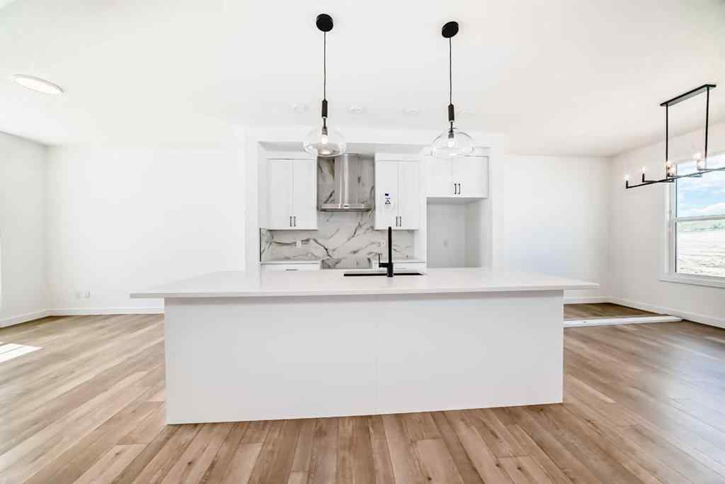 MLS® A2217577 - 430 Heartland Way  in Heartland Cochrane, Residential