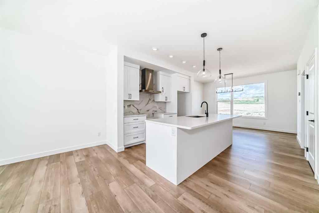 MLS® A2217577 - 430 Heartland Way  in Heartland Cochrane, Residential