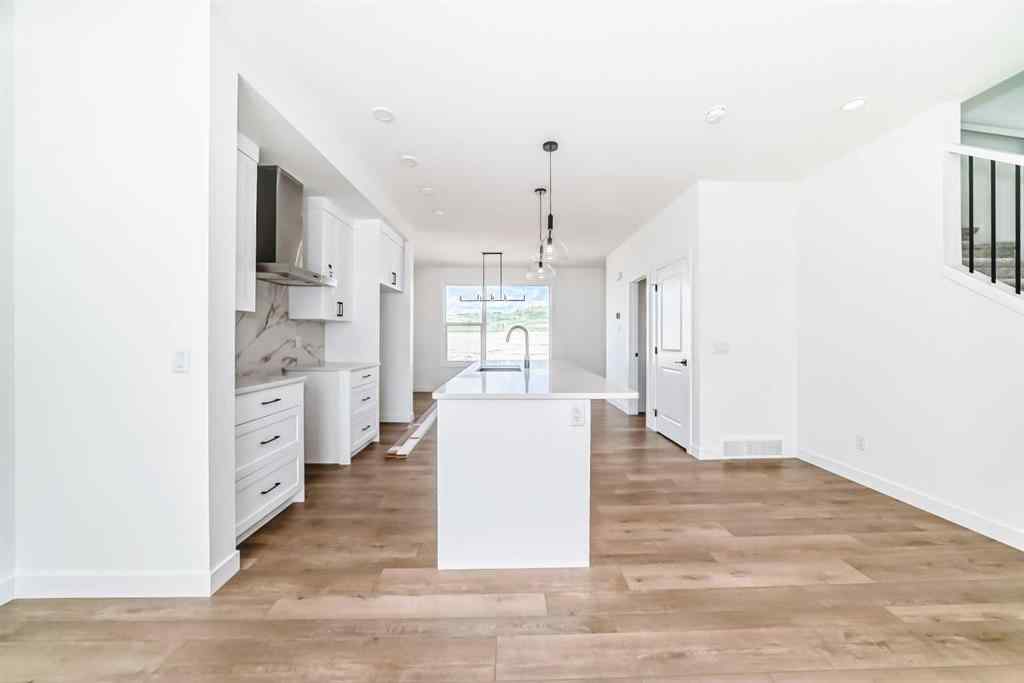 MLS® A2217577 - 430 Heartland Way  in Heartland Cochrane, Residential