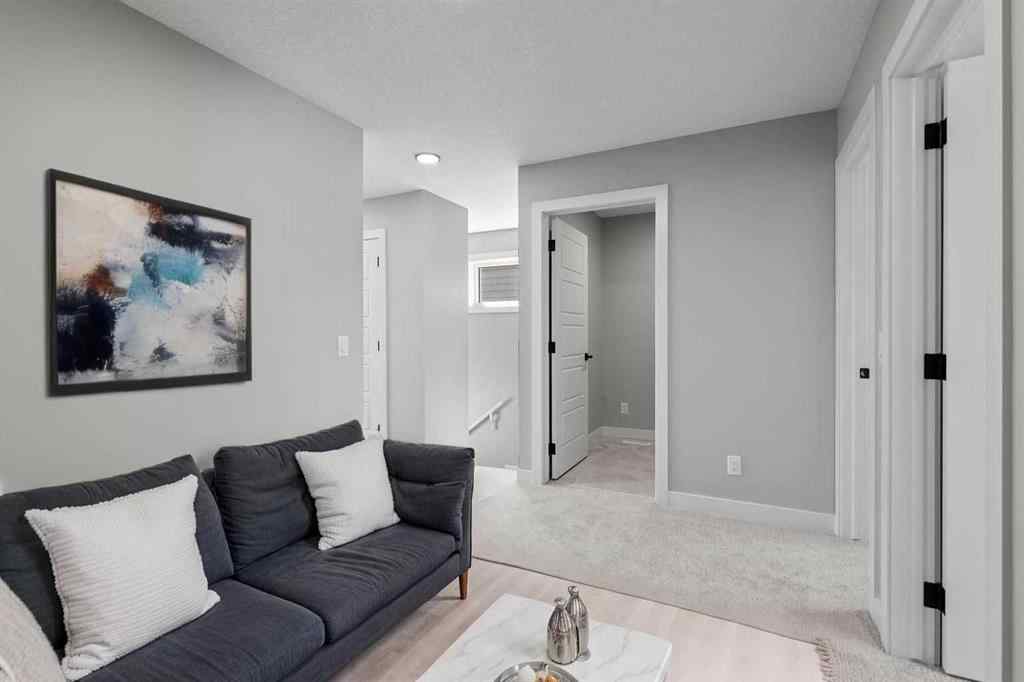 MLS® A2217676 - 65 Amblefield Heights NW in Moraine Calgary, Residential