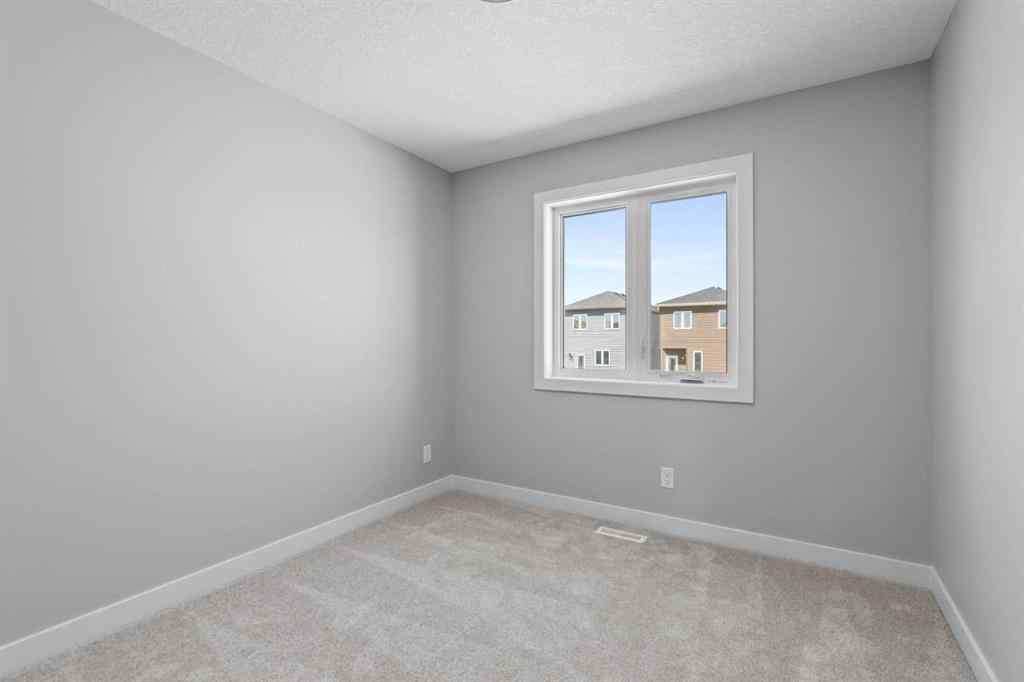 MLS® A2217676 - 65 Amblefield Heights NW in Moraine Calgary, Residential