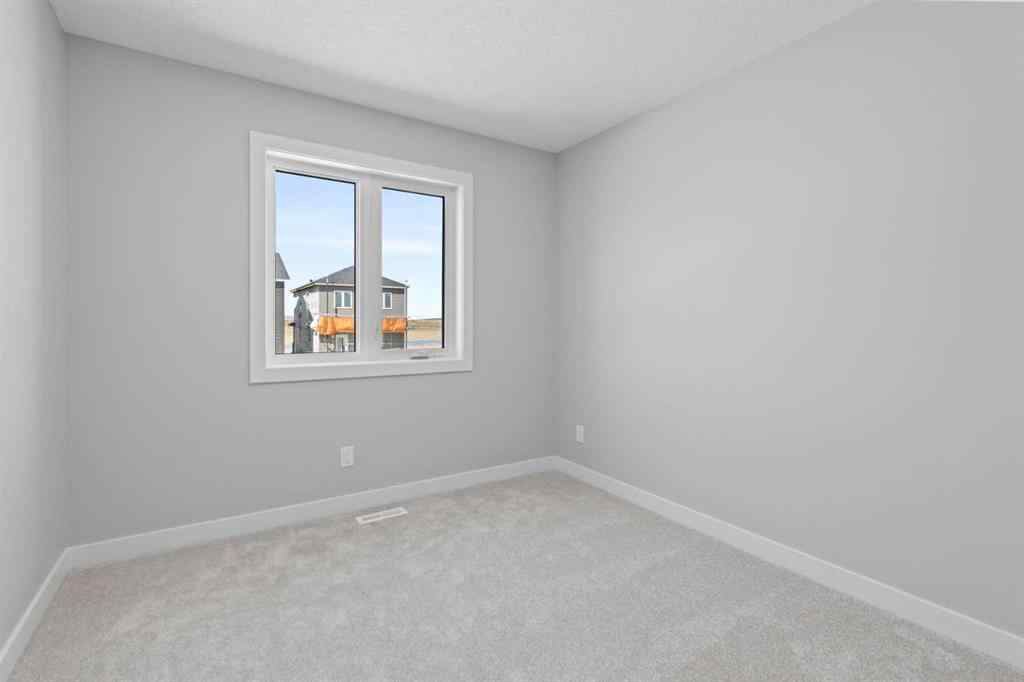 MLS® A2217676 - 65 Amblefield Heights NW in Moraine Calgary, Residential