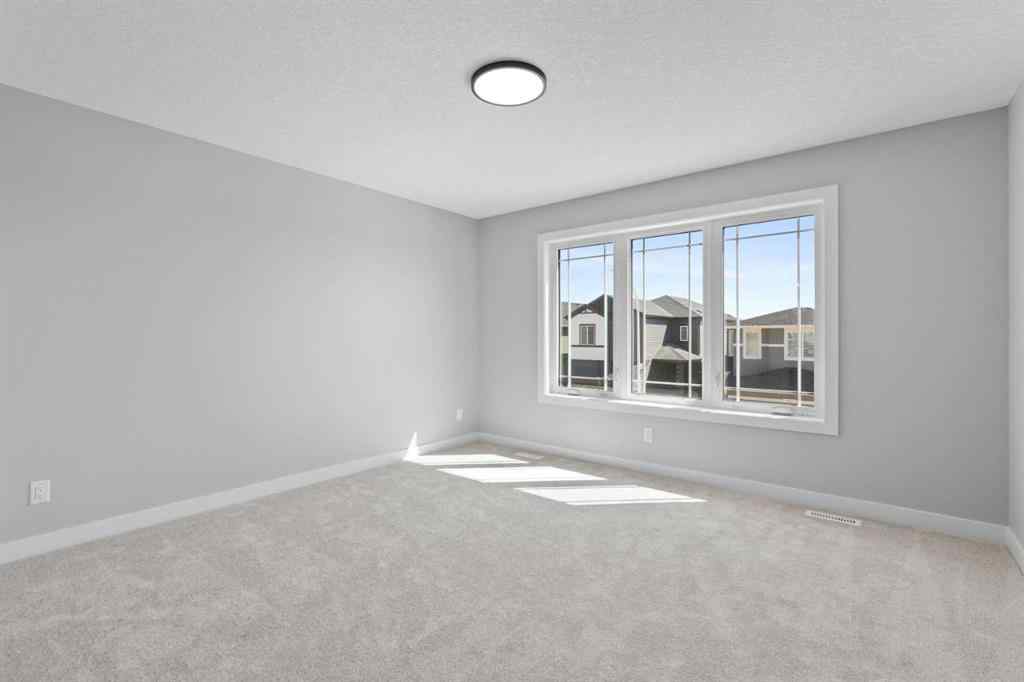 MLS® A2217676 - 65 Amblefield Heights NW in Moraine Calgary, Residential