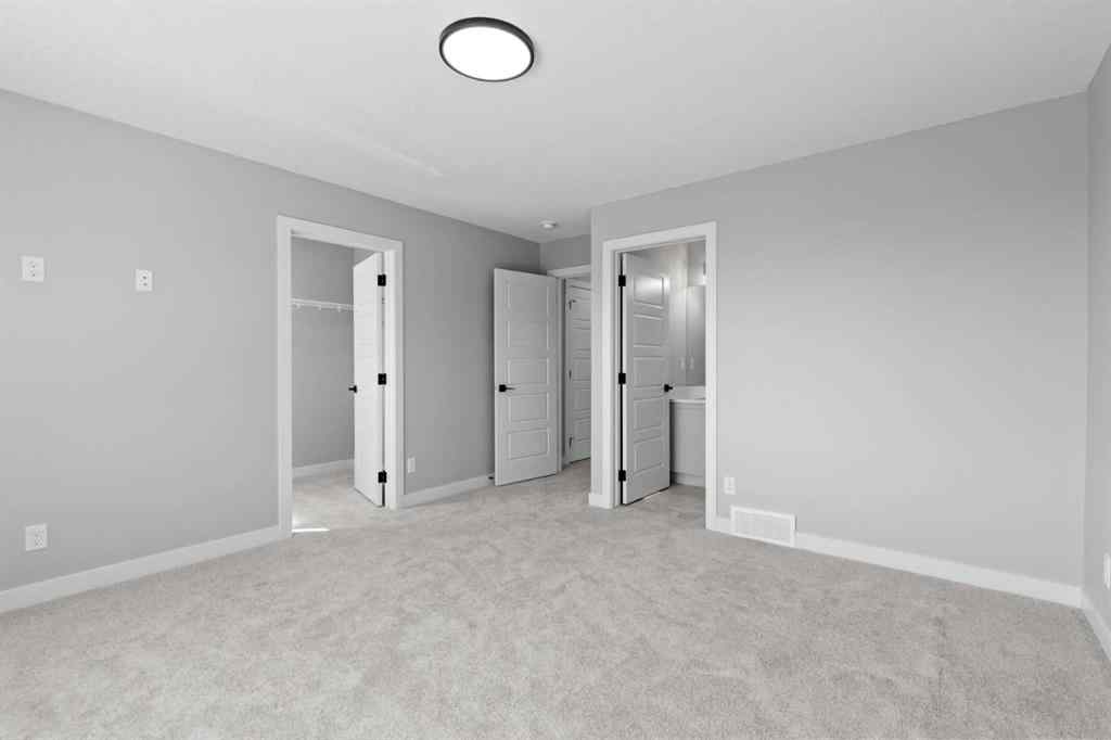 MLS® A2217676 - 65 Amblefield Heights NW in Moraine Calgary, Residential
