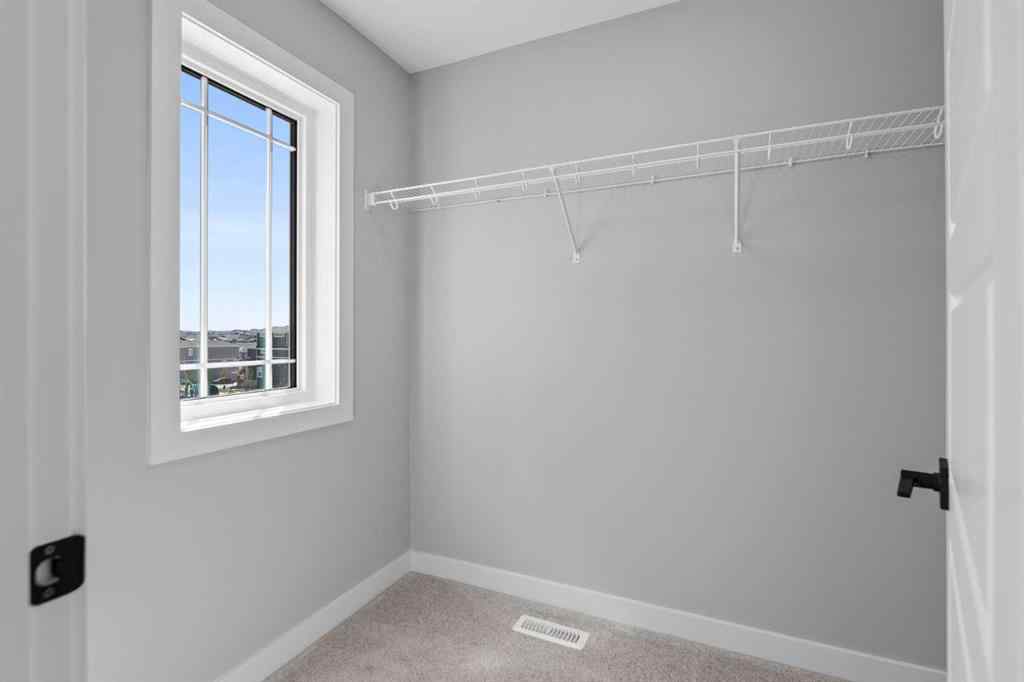 MLS® A2217676 - 65 Amblefield Heights NW in Moraine Calgary, Residential