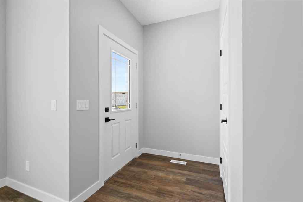 MLS® A2217676 - 65 Amblefield Heights NW in Moraine Calgary, Residential
