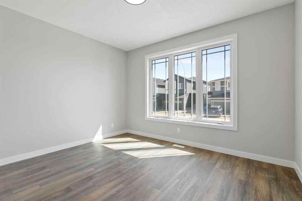 MLS® A2217676 - 65 Amblefield Heights NW in Moraine Calgary, Residential