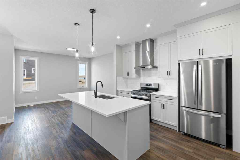 MLS® A2217676 - 65 Amblefield Heights NW in Moraine Calgary, Residential