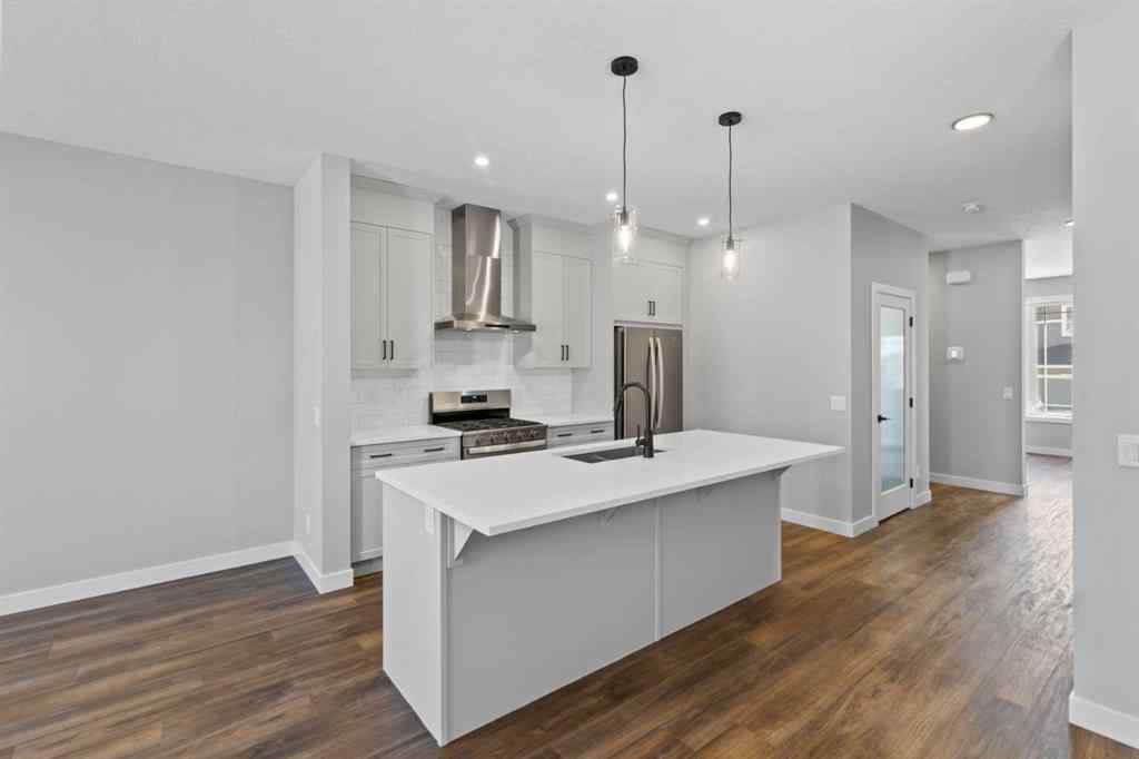 MLS® A2217676 - 65 Amblefield Heights NW in Moraine Calgary, Residential