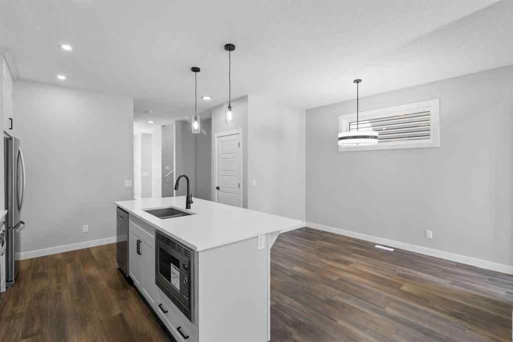 MLS® A2217676 - 65 Amblefield Heights NW in Moraine Calgary, Residential