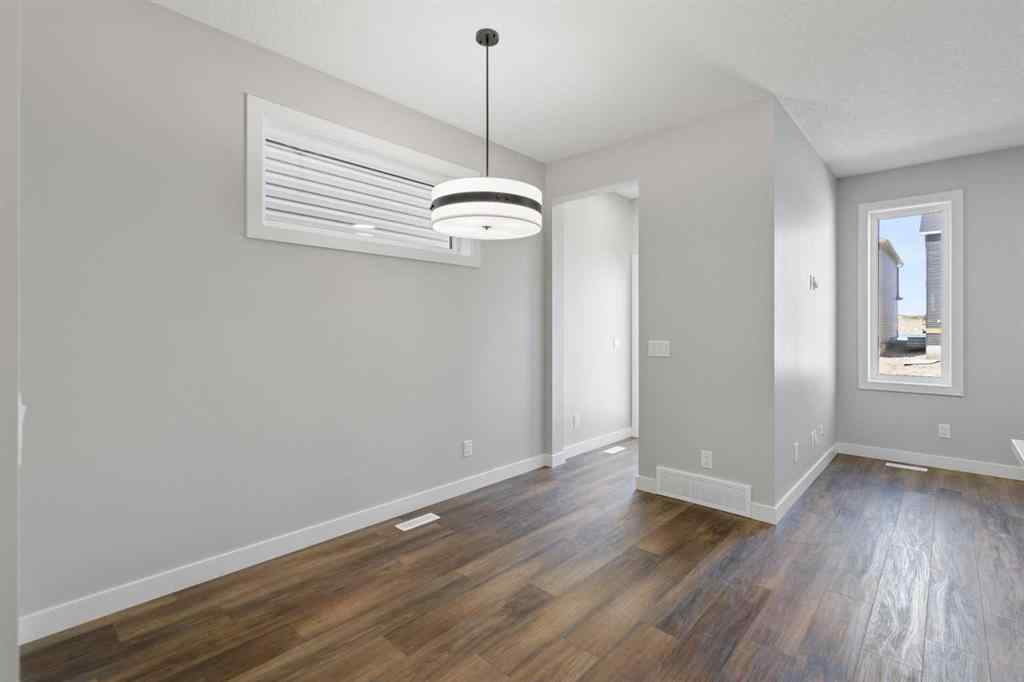 MLS® A2217676 - 65 Amblefield Heights NW in Moraine Calgary, Residential