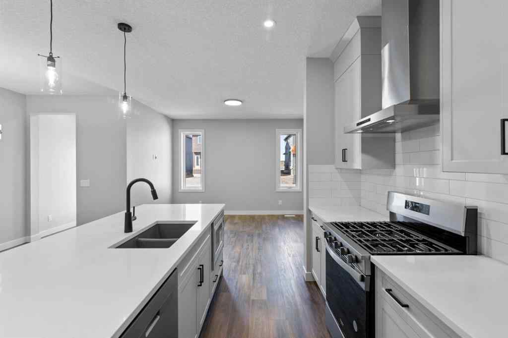 MLS® A2217676 - 65 Amblefield Heights NW in Moraine Calgary, Residential