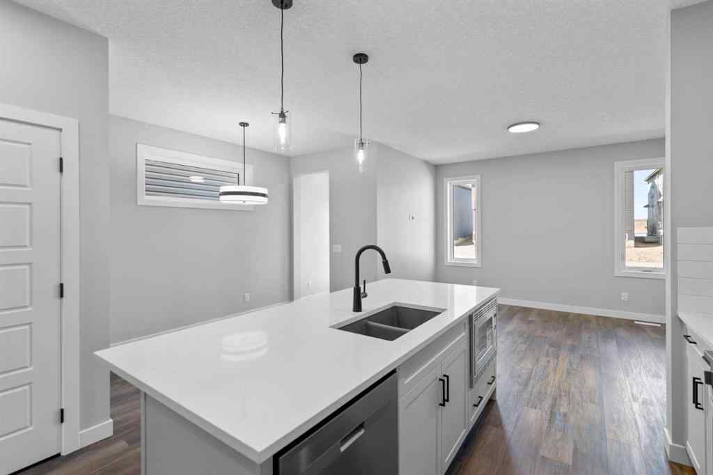 MLS® A2217676 - 65 Amblefield Heights NW in Moraine Calgary, Residential