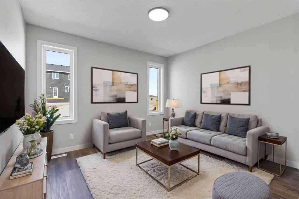 MLS® A2217676 - 65 Amblefield Heights NW in Moraine Calgary, Residential