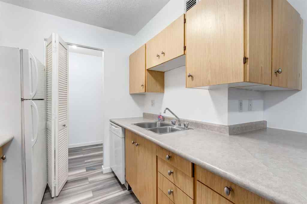MLS® A2217749 - Unit #205A 7301 4A Street SW in Kingsland Calgary, Residential
