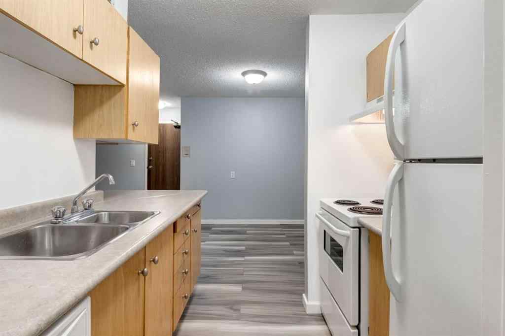 MLS® A2217749 - Unit #205A 7301 4A Street SW in Kingsland Calgary, Residential