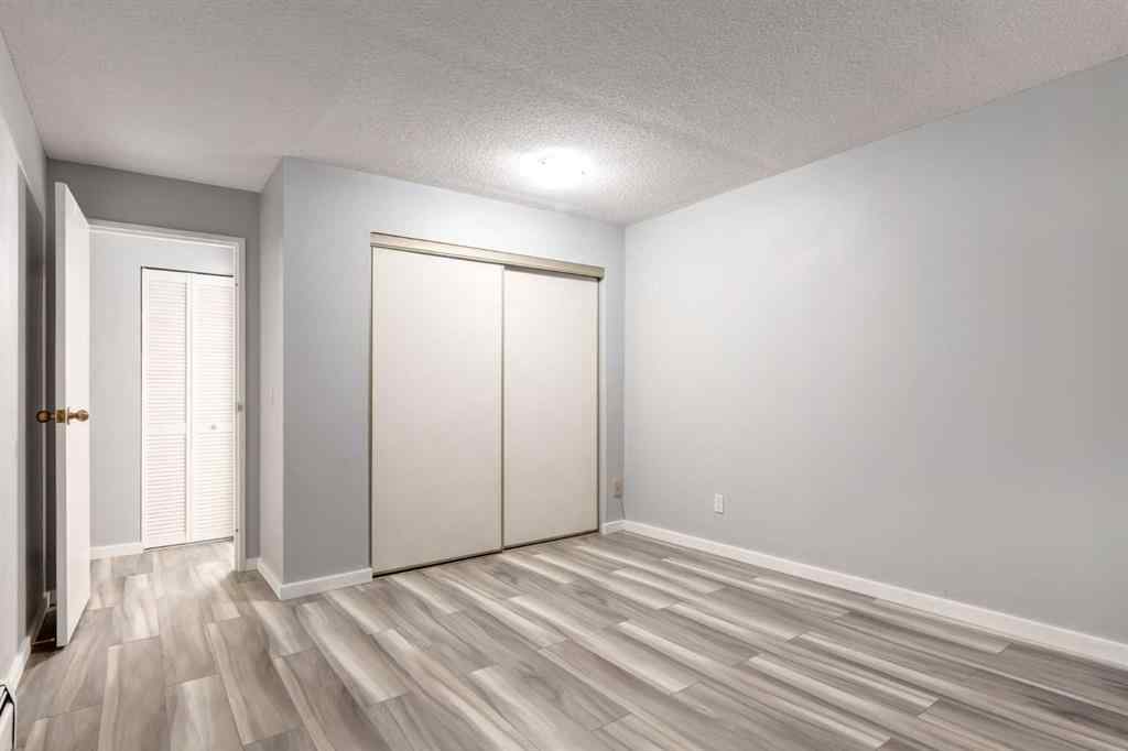 MLS® A2217749 - Unit #205A 7301 4A Street SW in Kingsland Calgary, Residential