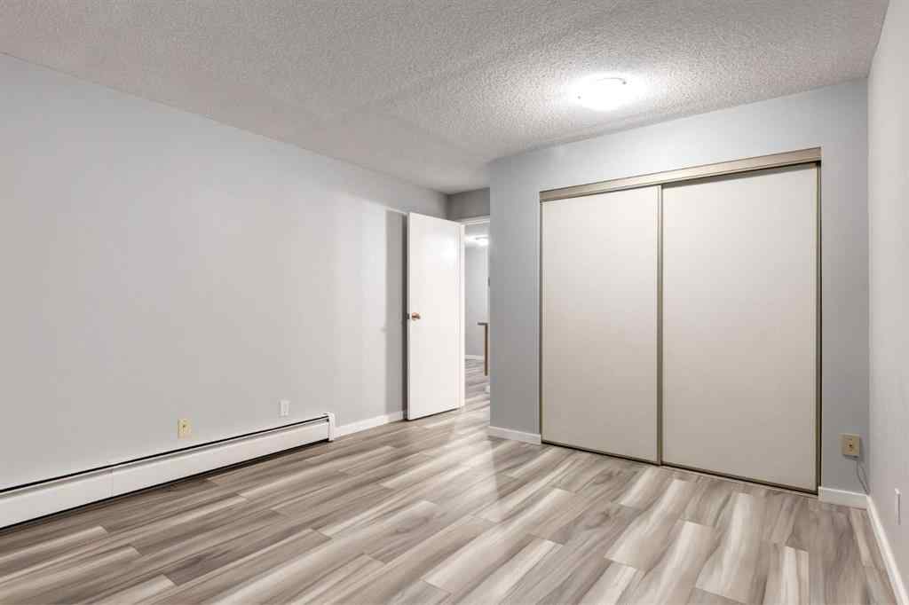 MLS® A2217749 - Unit #205A 7301 4A Street SW in Kingsland Calgary, Residential