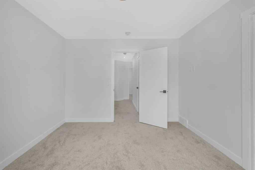 MLS® A2217984 - 8814 48 Street NE in Saddle Ridge Calgary, Residential