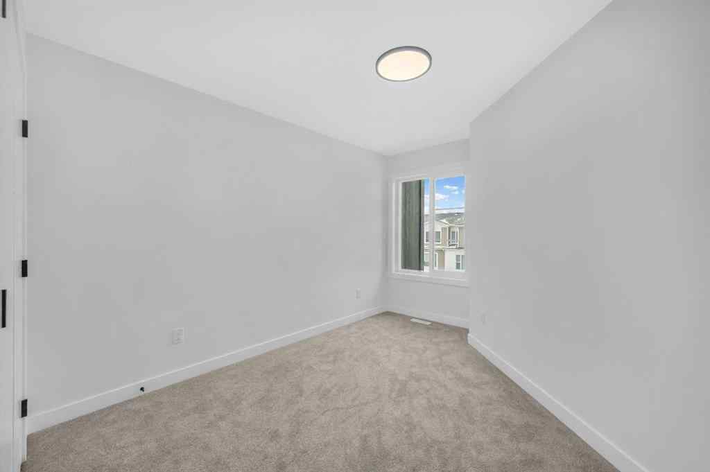 MLS® A2217984 - 8814 48 Street NE in Saddle Ridge Calgary, Residential
