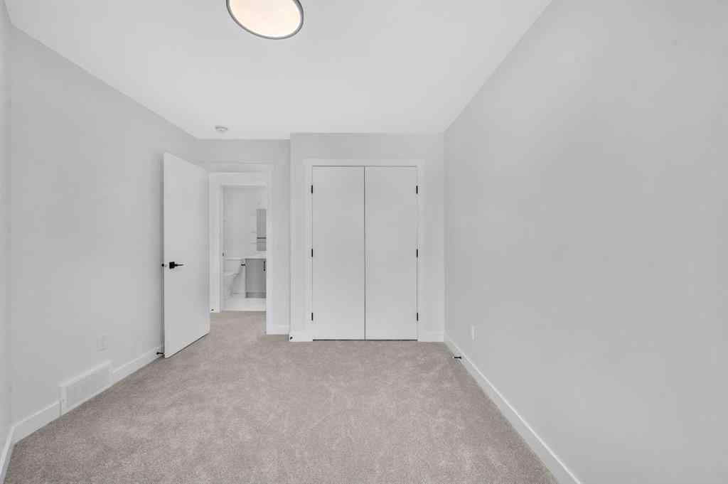 MLS® A2217984 - 8814 48 Street NE in Saddle Ridge Calgary, Residential