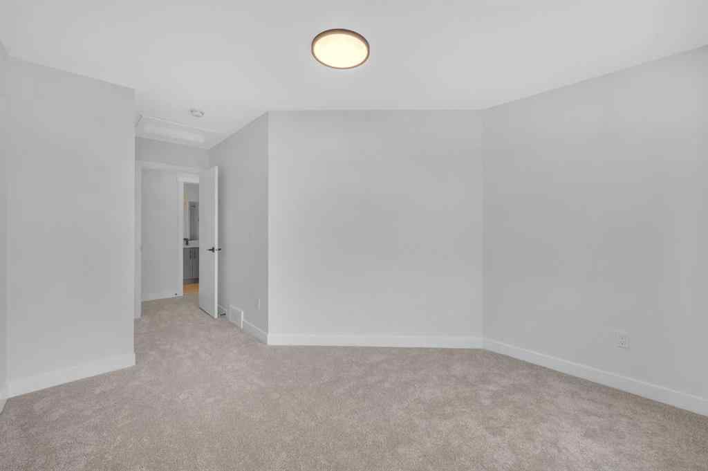 MLS® A2217984 - 8814 48 Street NE in Saddle Ridge Calgary, Residential