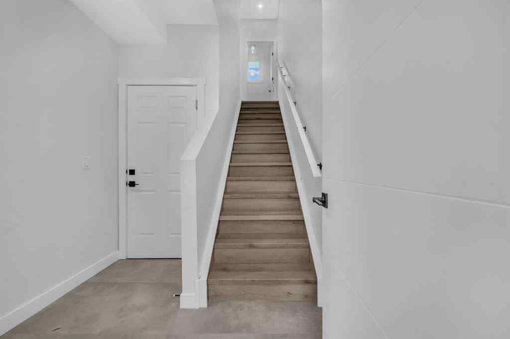 MLS® A2217984 - 8814 48 Street NE in Saddle Ridge Calgary, Residential