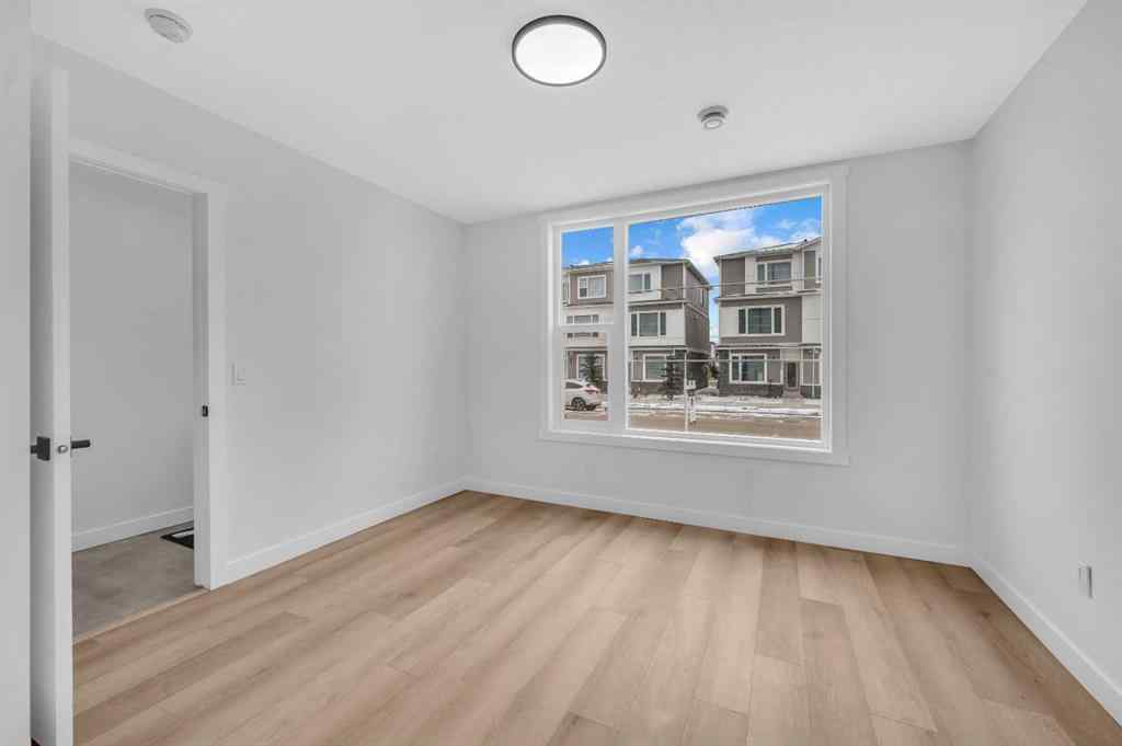 MLS® A2217984 - 8814 48 Street NE in Saddle Ridge Calgary, Residential