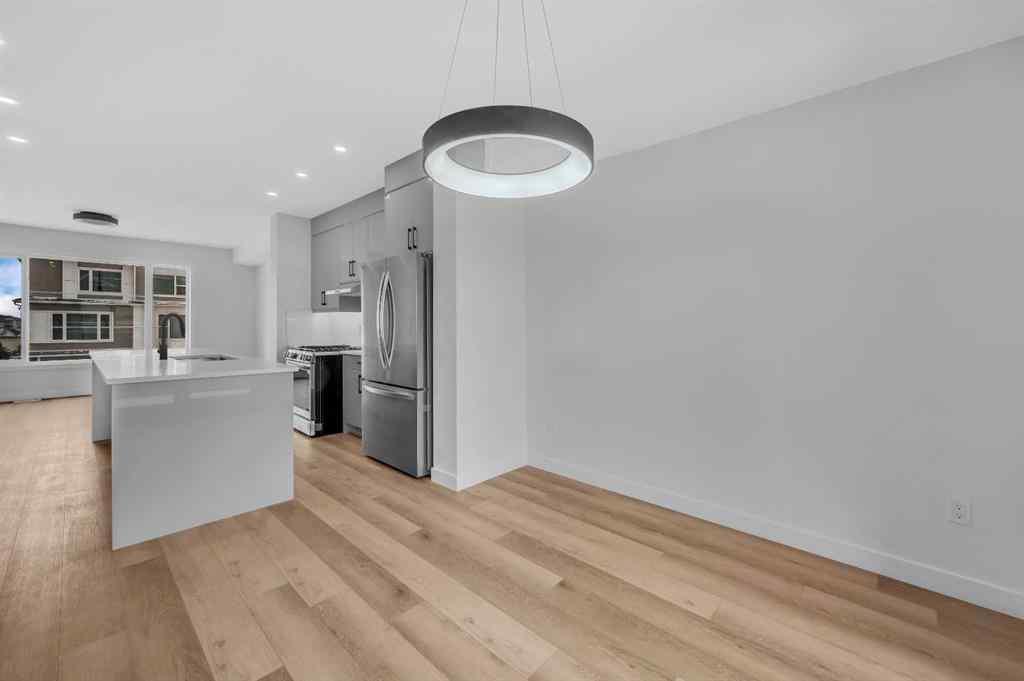 MLS® A2217984 - 8814 48 Street NE in Saddle Ridge Calgary, Residential