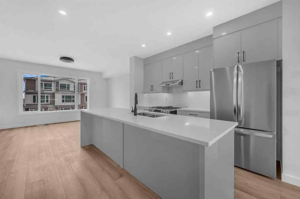 MLS® A2217984 - 8814 48 Street NE in Saddle Ridge Calgary, Residential