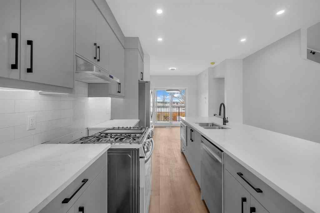 MLS® A2217984 - 8814 48 Street NE in Saddle Ridge Calgary, Residential