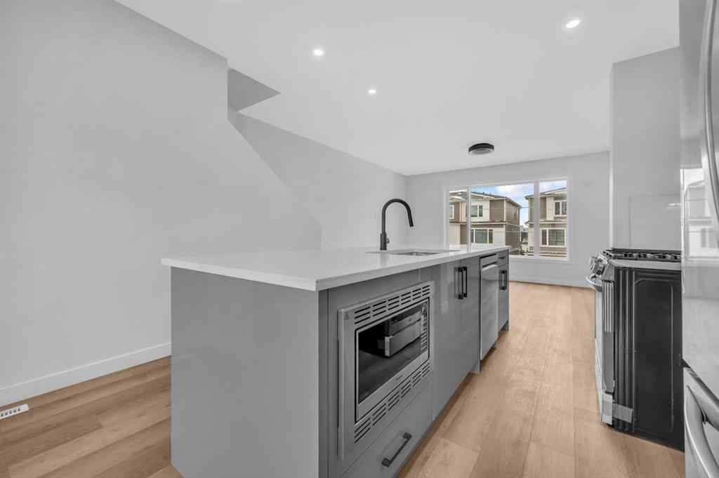 MLS® A2217984 - 8814 48 Street NE in Saddle Ridge Calgary, Residential