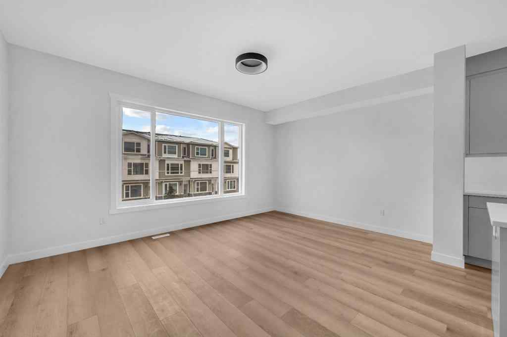 MLS® A2217984 - 8814 48 Street NE in Saddle Ridge Calgary, Residential