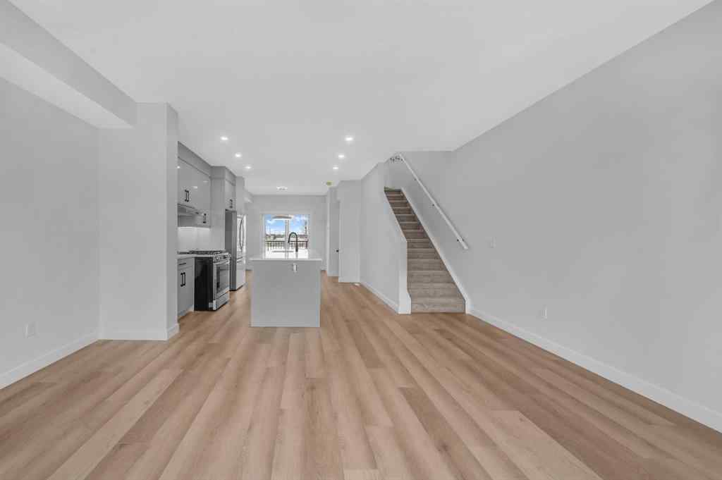 MLS® A2217984 - 8814 48 Street NE in Saddle Ridge Calgary, Residential