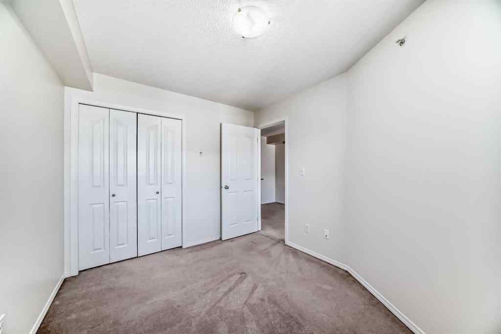 MLS® A2218066 - Unit #411 7130 80 Avenue NE in Saddle Ridge Calgary, Residential