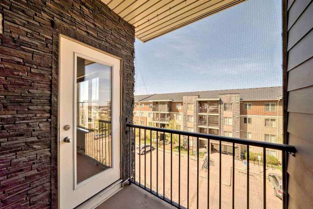 MLS® A2218066 - Unit #411 7130 80 Avenue NE in Saddle Ridge Calgary, Residential