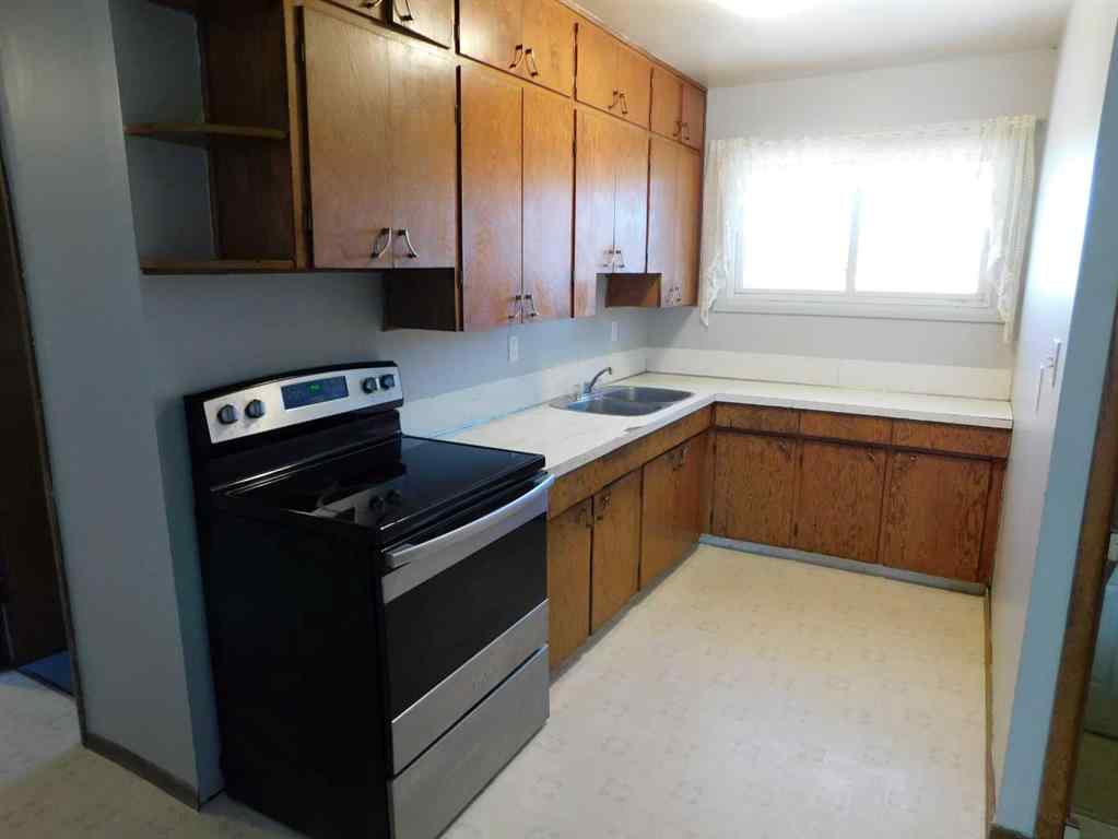 MLS® A2218208 - 68 Spruce Avenue W in Sunnylea Brooks, Residential
