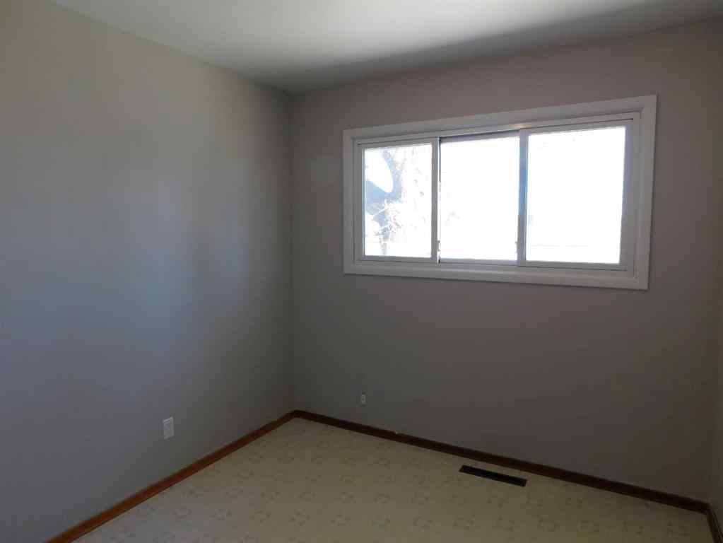 MLS® A2218208 - 68 Spruce Avenue W in Sunnylea Brooks, Residential