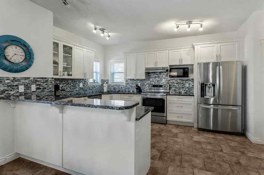 MLS® A2218370 - 30 Baywater Cape SW in Bayside Airdrie, Residential