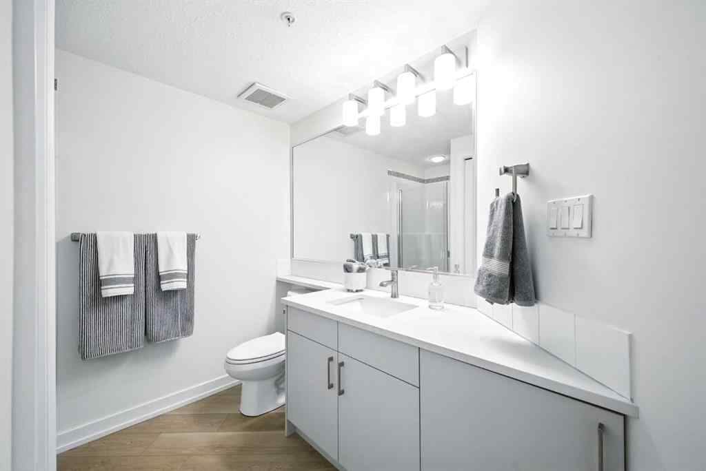 MLS® A2218387 - Unit #409 1718 14 Avenue NW in Hounsfield Heights/Briar Hill Calgary, Residential