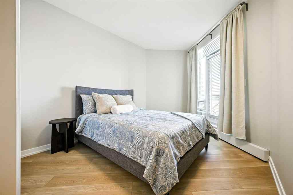 MLS® A2218387 - Unit #409 1718 14 Avenue NW in Hounsfield Heights/Briar Hill Calgary, Residential