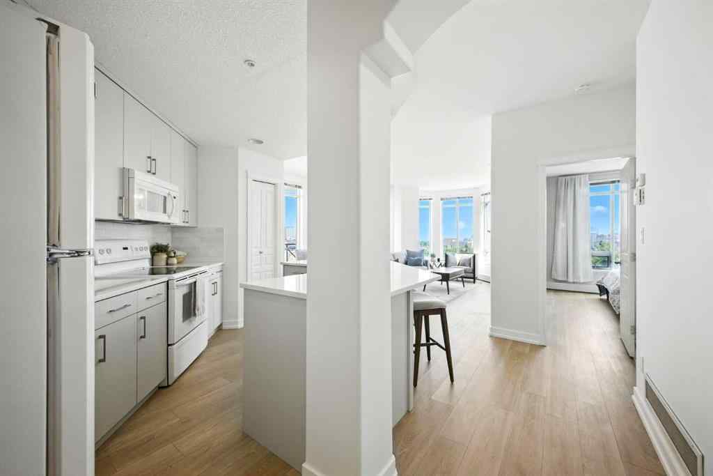 MLS® A2218387 - Unit #409 1718 14 Avenue NW in Hounsfield Heights/Briar Hill Calgary, Residential