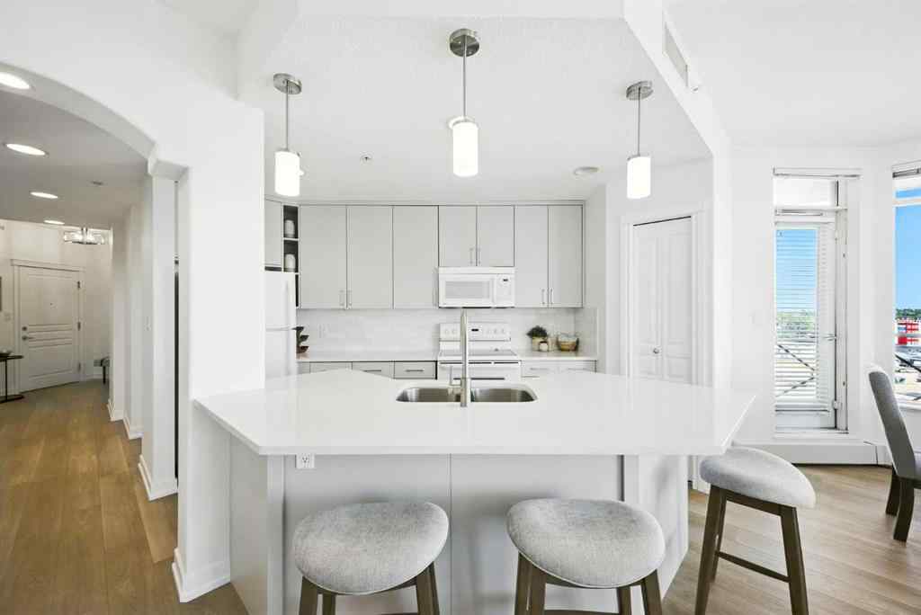 MLS® A2218387 - Unit #409 1718 14 Avenue NW in Hounsfield Heights/Briar Hill Calgary, Residential