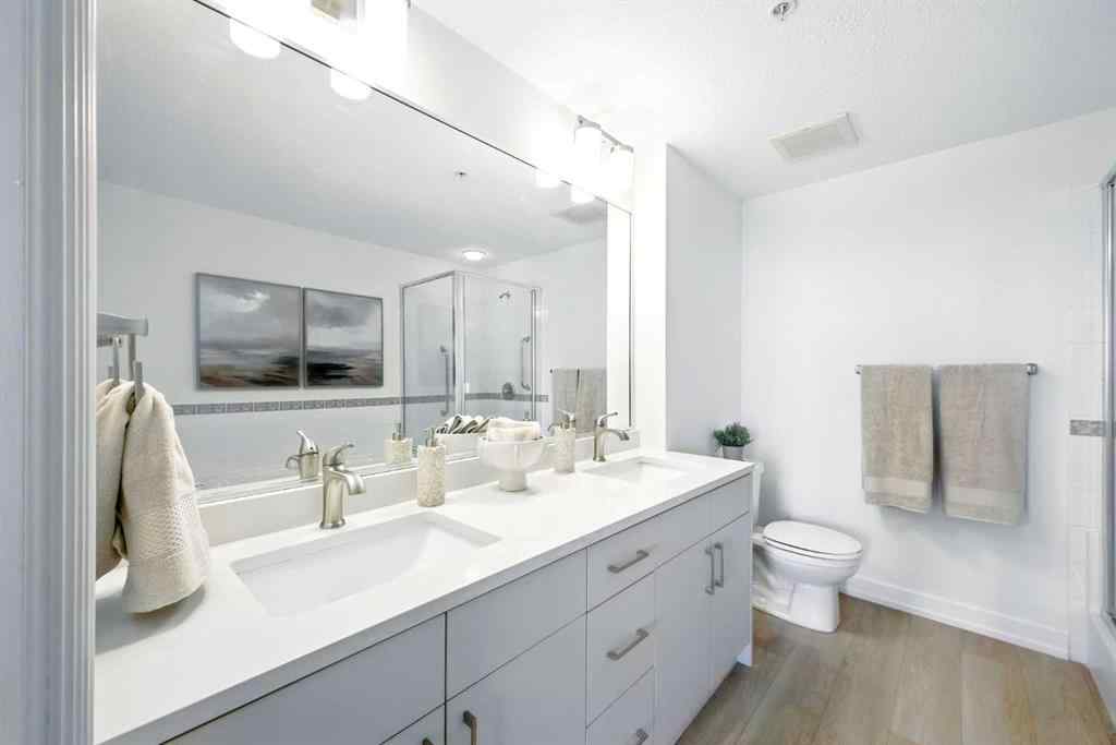MLS® A2218387 - Unit #409 1718 14 Avenue NW in Hounsfield Heights/Briar Hill Calgary, Residential