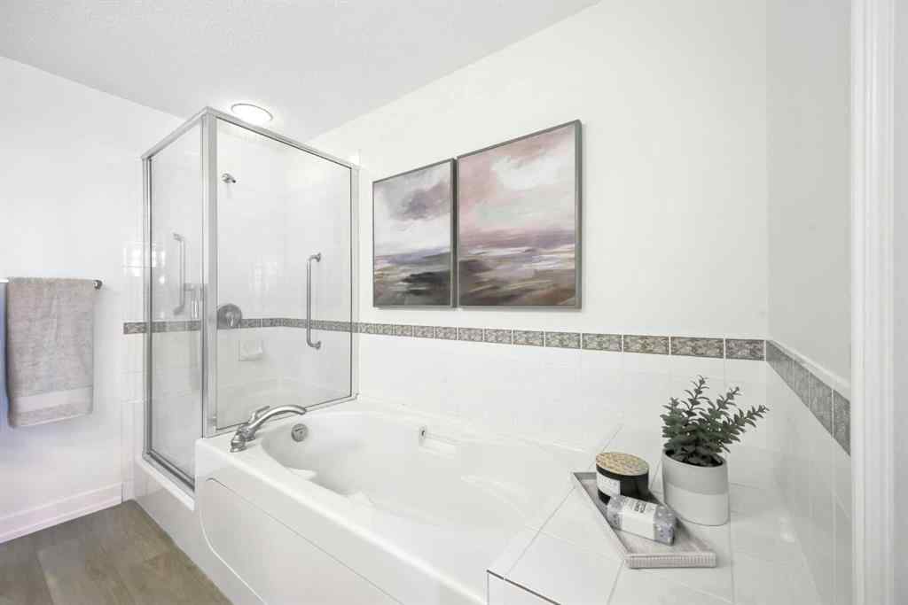 MLS® A2218387 - Unit #409 1718 14 Avenue NW in Hounsfield Heights/Briar Hill Calgary, Residential