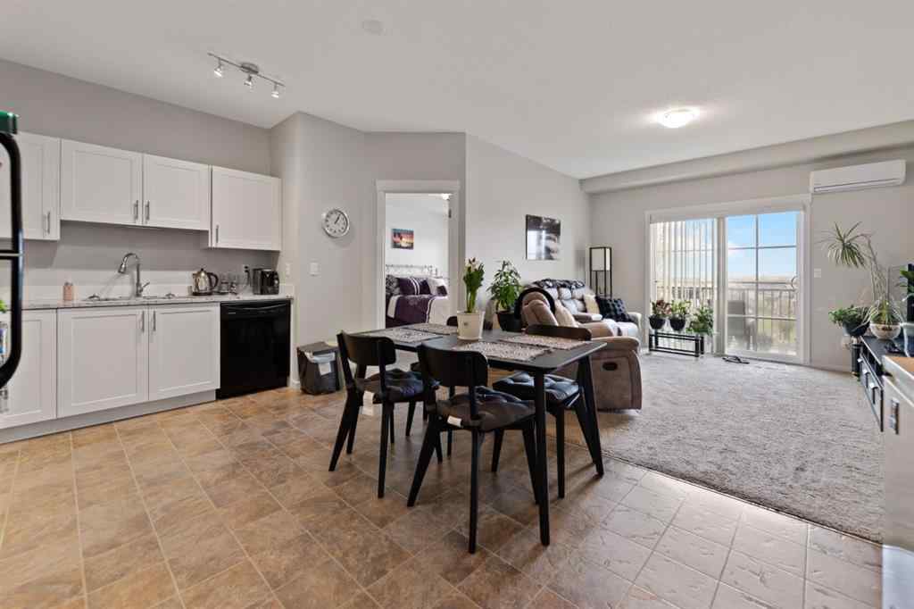MLS® A2218475 - Unit #6411 755 Copperpond Boulevard SE in Copperfield Calgary, Residential